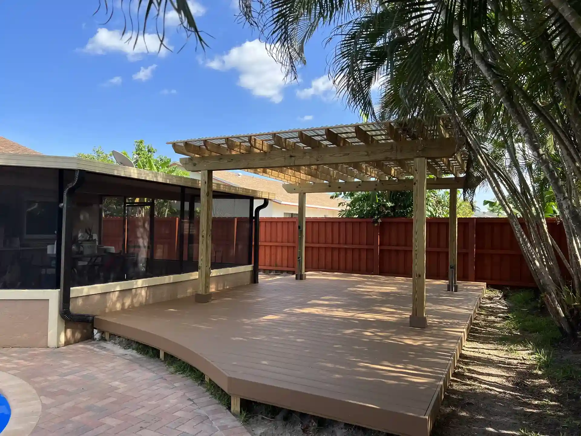 Ground-Level Deck With Pergola Shade Structure - Types Of Deck Designs in south florida