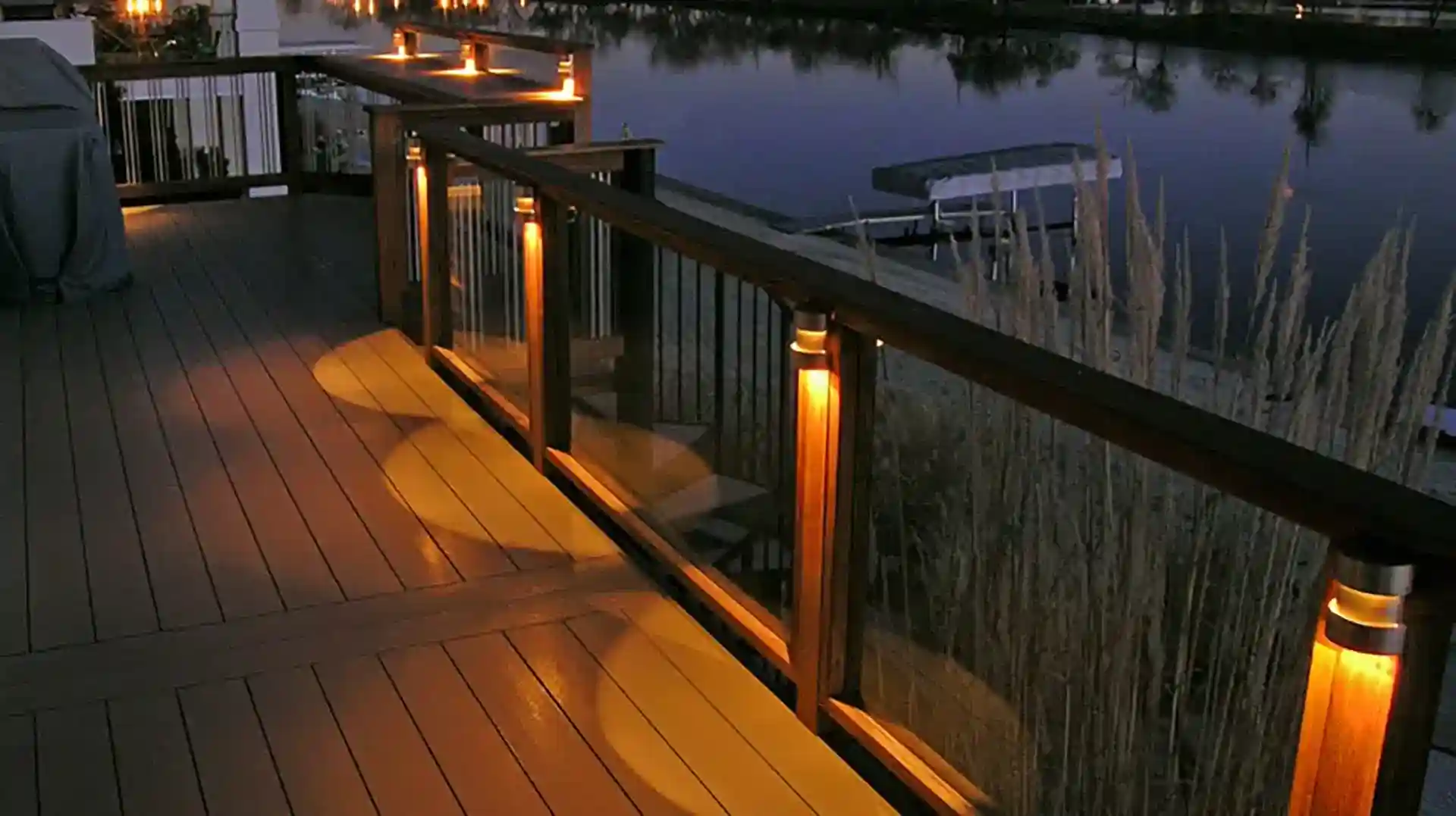 Waterfront Deck with Integrated Railing Lighting - Types Of Deck Designs in south florida